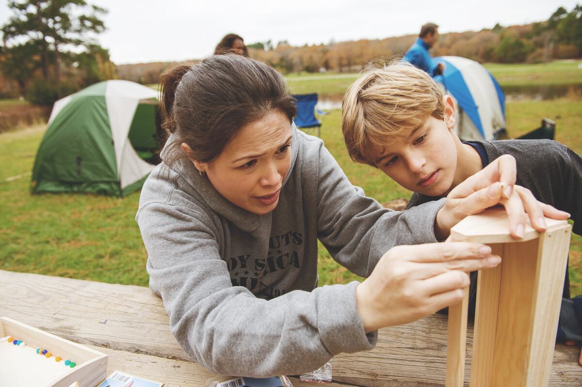 Parent and child working on a craft